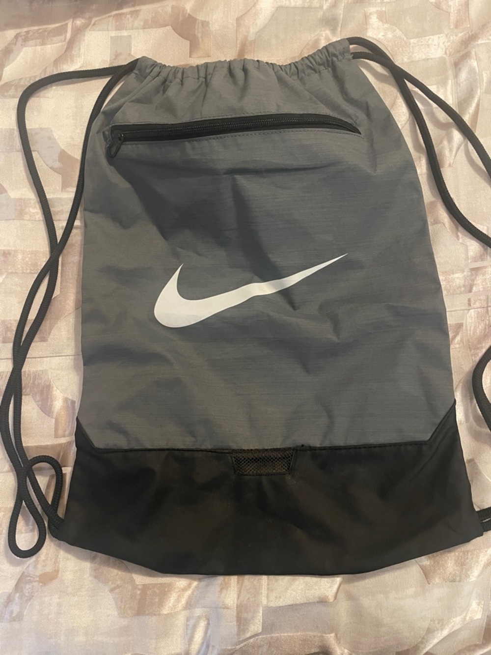 Nike Gray and Black Drawstring Backpack with White Swoosh